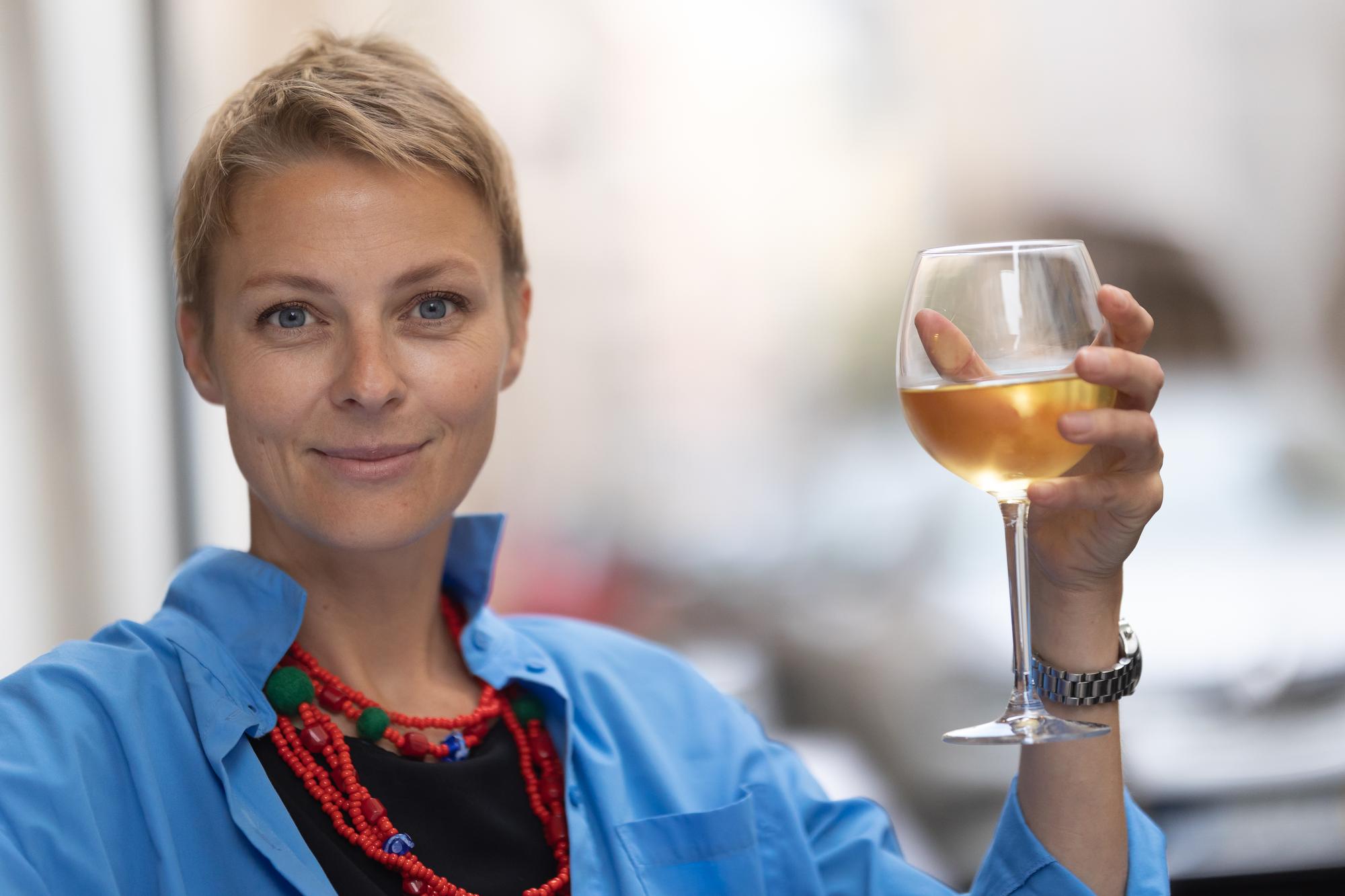 Sommelier holding wine